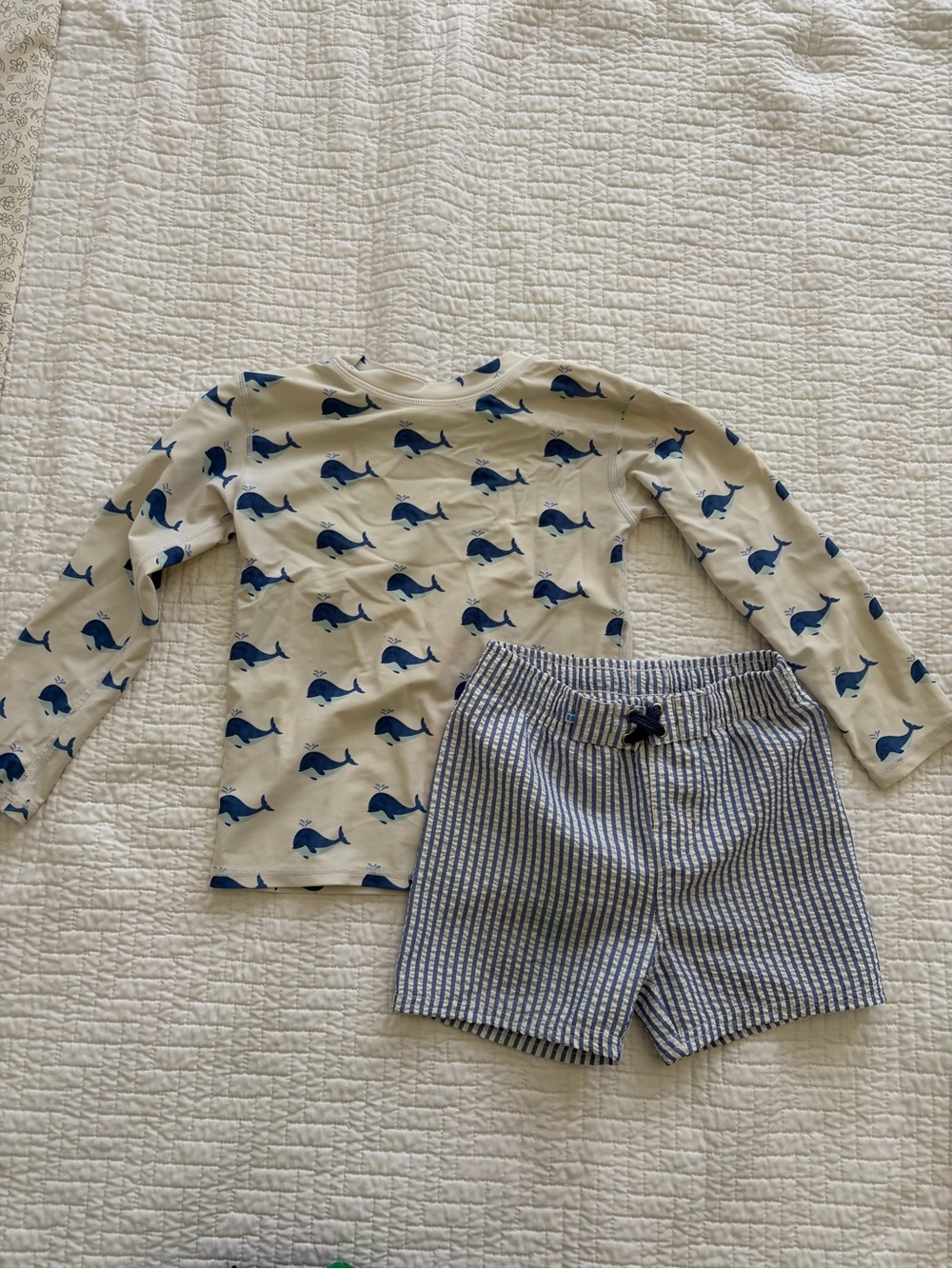 Ruffle Butts Cream Rash Guard and Blue stripe swim trunks